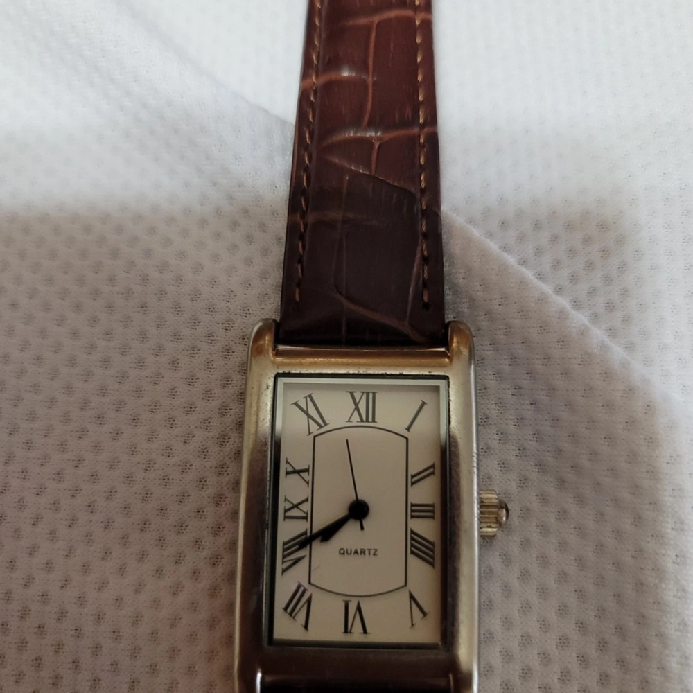 Generic Quartz Watch With White Face, Roman Numerals, Second Hand And Black Band